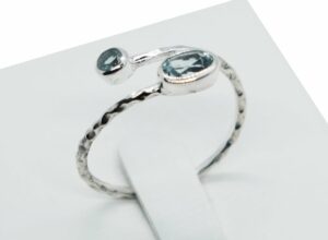 Silver Ring Twist Cut Topaz