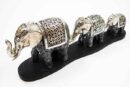 Elephants Walking In A Row